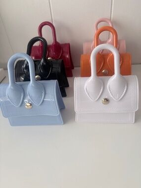 Cute Purses with a mystery piece of jewelry inside!